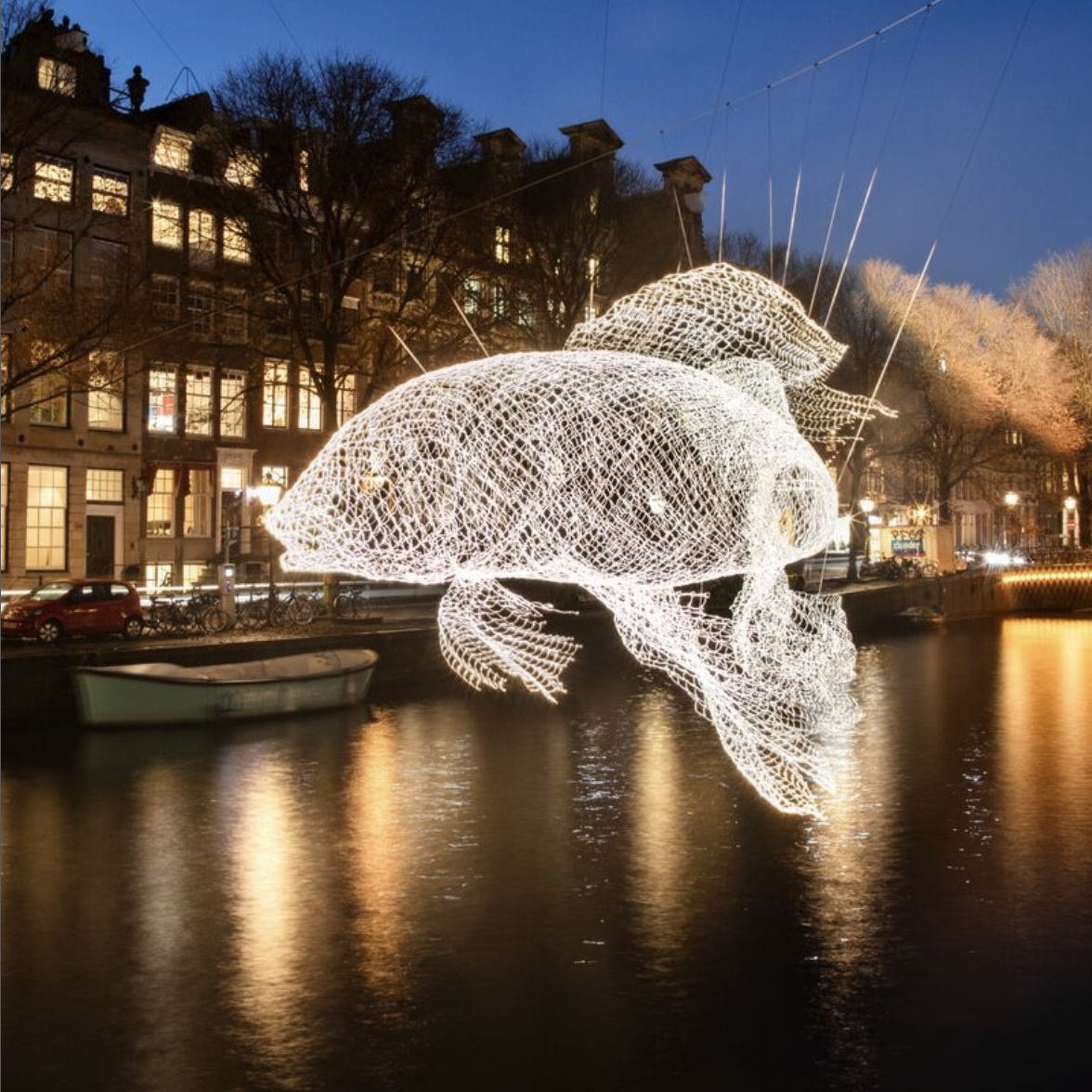 Art installation with LED lights reflecting on water